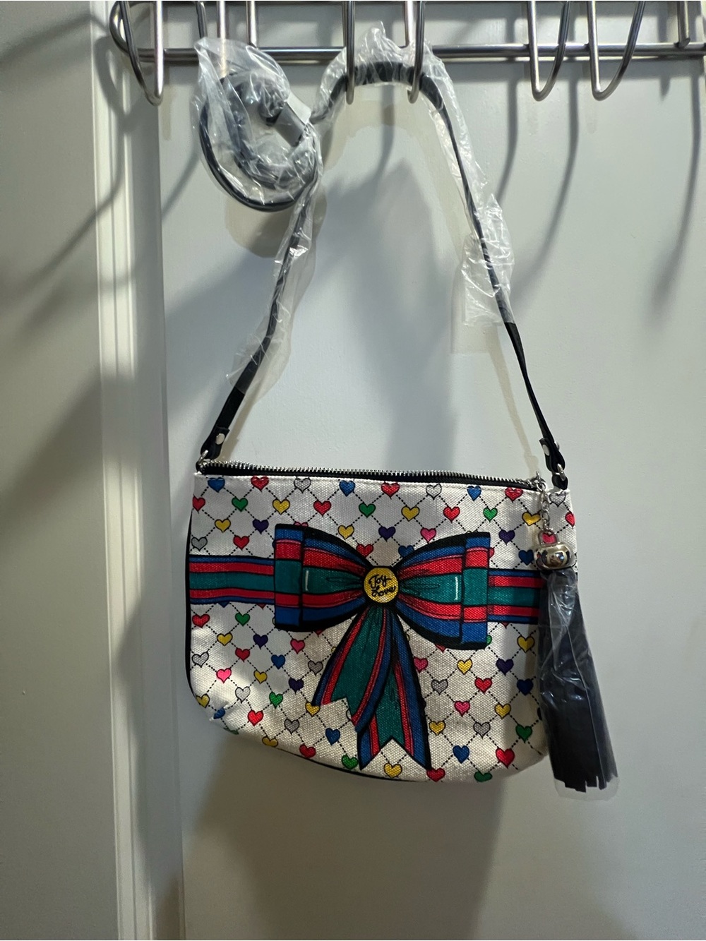 Brighton White Mini Crossbody with Multicolor Heart Print and Teal-Red Bow